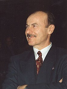 con-komlos